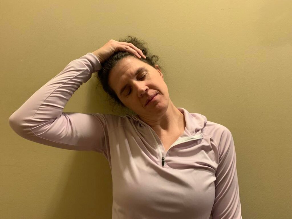 Upper trap stretch exercise for neck pain and stiffness